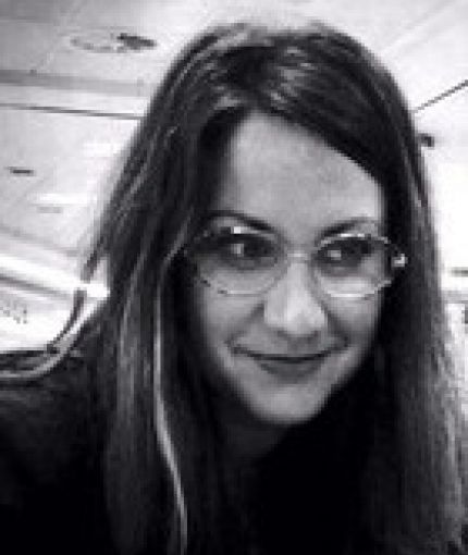 Headshot of Maya Mayblin