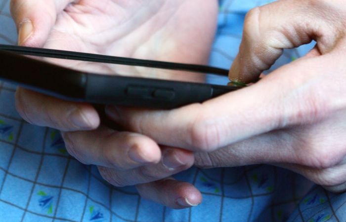 Patient on mobile phone